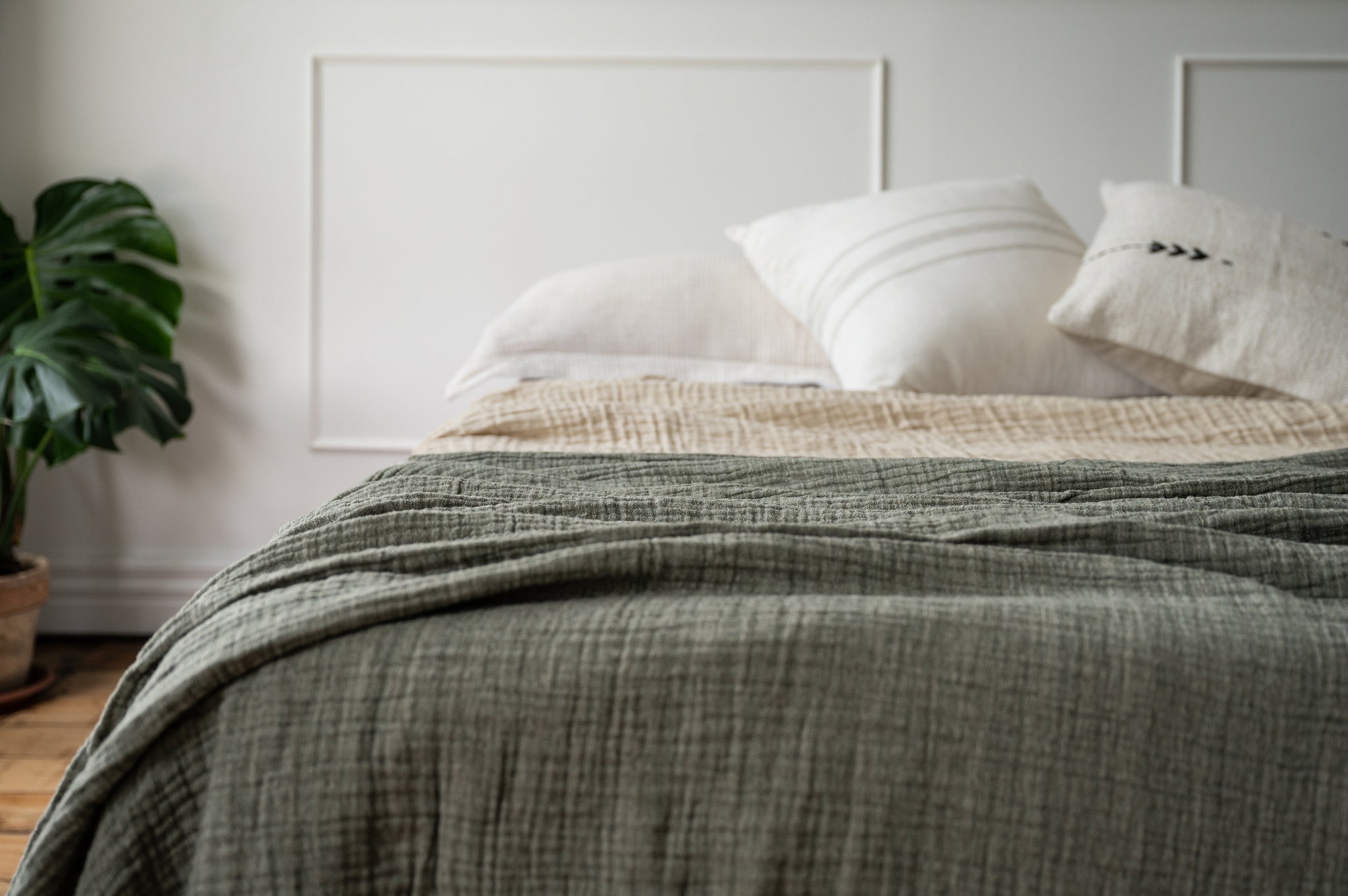 Close up of Pure Linen Blankets on a bed in a chic loft apartment